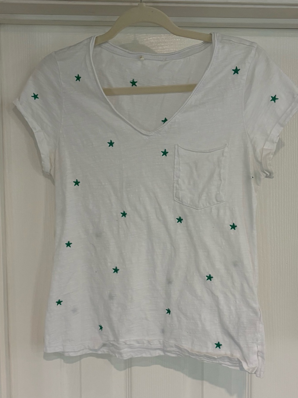 White V-Neck Pocket Tee with Embroidered Green Star